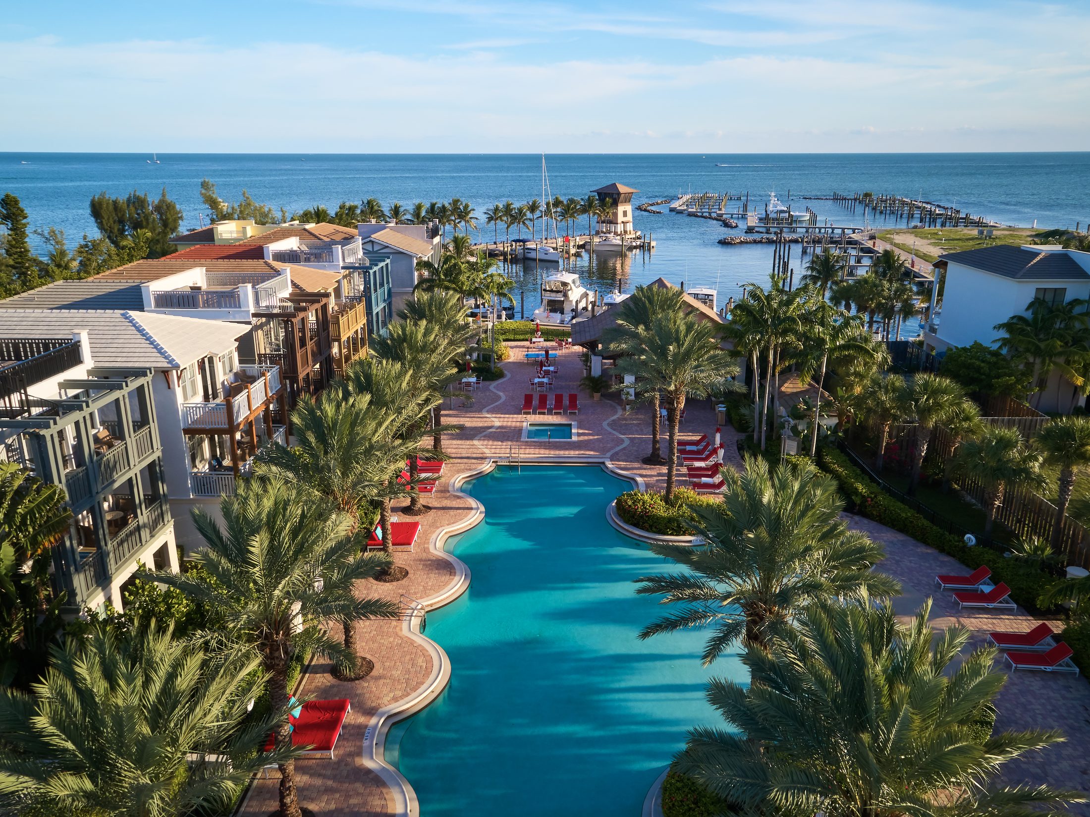 Aerial view of Marlin Bay Resort & Marina with its lagoon pool opening onto the deep-water marina and the Florida Keys beyond