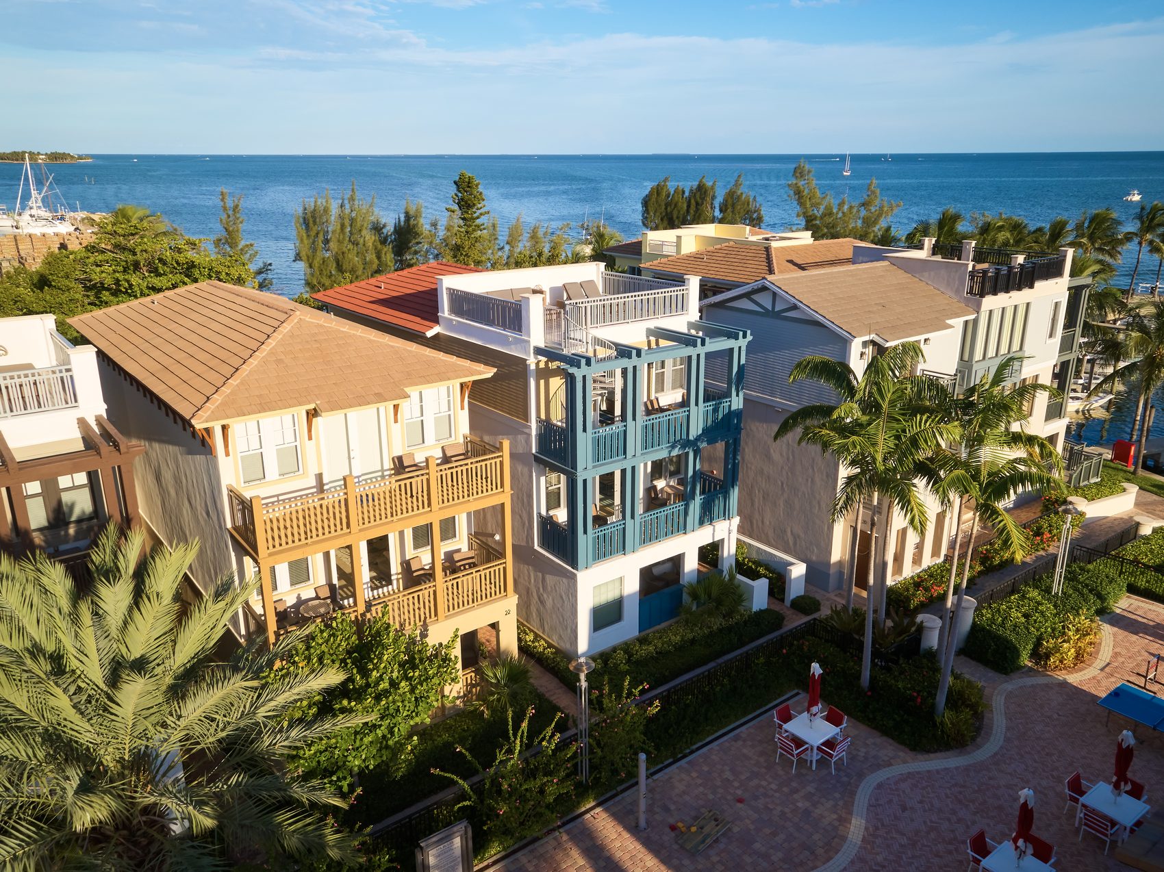 Aerial of the detached waterfront residences at Marlin Bay above the 99-slip marina